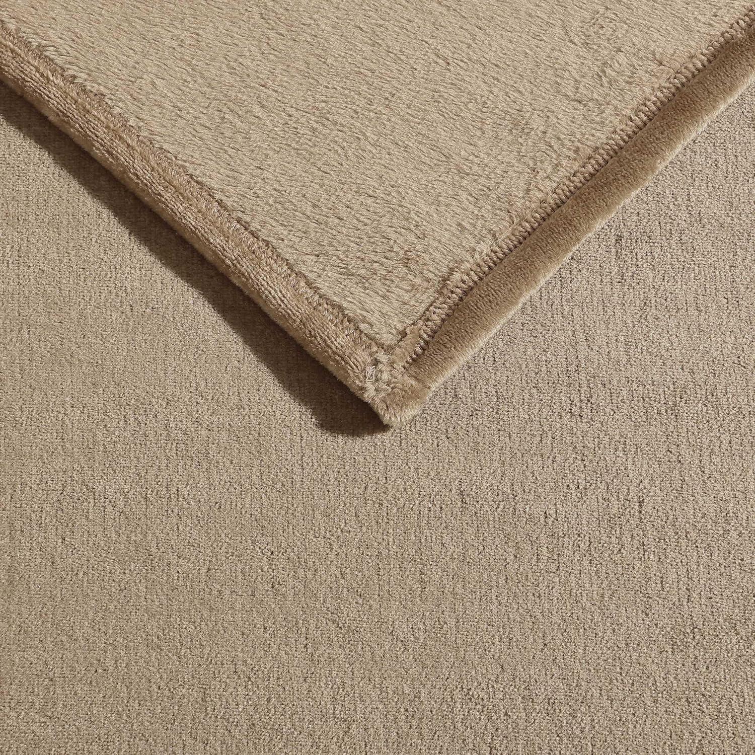 imageNautica Twin Blanket Soft Plush Fleece Bedding Ideal for Bed or Couch Dorm Essentials OekoTex Certified Solid RedBrown
